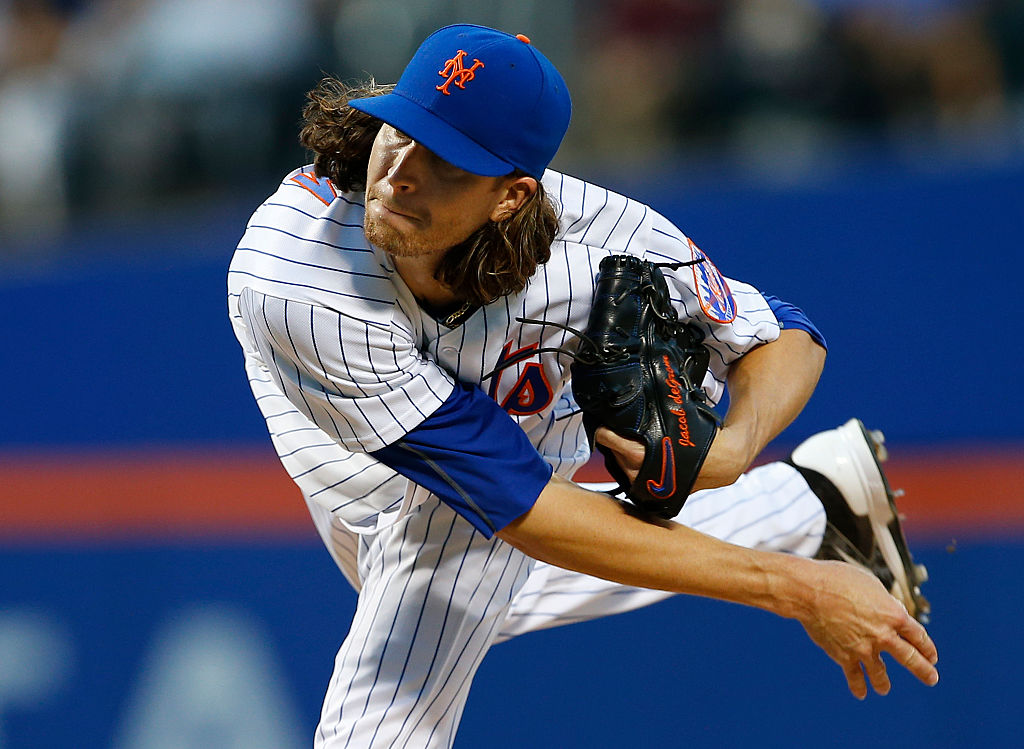 Jacob de Grom #48 of the New York Mets delivers a pitch against third inning