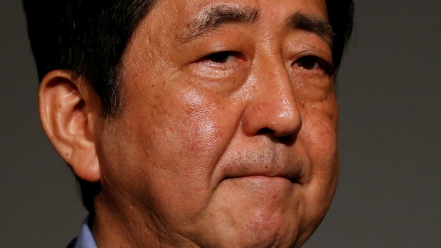 Prime Minister Shinzo Abe's government has been pushing for Japan to take on greater military roles abroad as a new defence report highlights security threats posed by North Korea and China