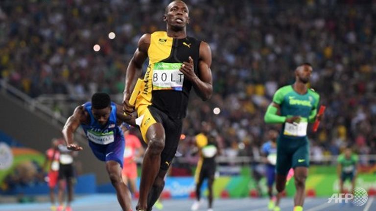 Jamaica's Usain Bolt crosses the finish line to help Jamaica win men's 4x100m gold.
   
 

  Enlarge  Caption