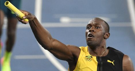 Jamaica's Usain Bolt celebrates winning the gold in the men's 4x100m relay final on Friday. AP