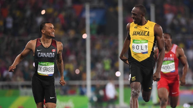 USC's Andre De Grasse won silver in the men's 200M just behind Usain Bolt