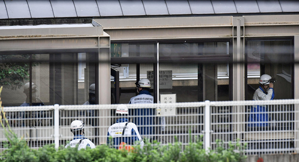 Rescue workers are seen in a facility for the disabled where a deadly attack by a knife-wielding man took place in Sagamihara Kanagawa prefecture Japan in this