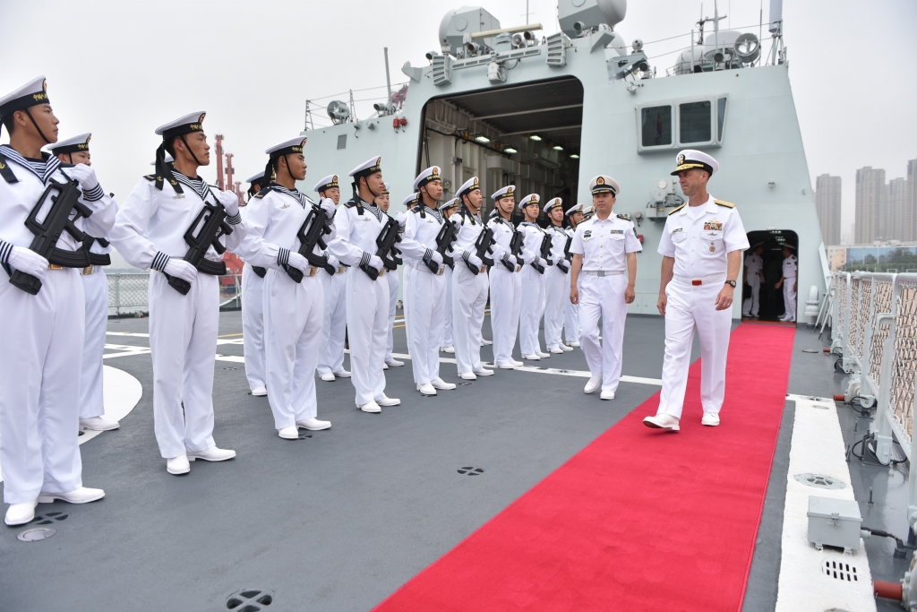 Chief of Naval Operations Adm. John Richardson visits the Chinese People's Liberation Army ) Submarine Academy North Sea Fleet Headquarters and a PLAN frigate and submarine in Qingdao China