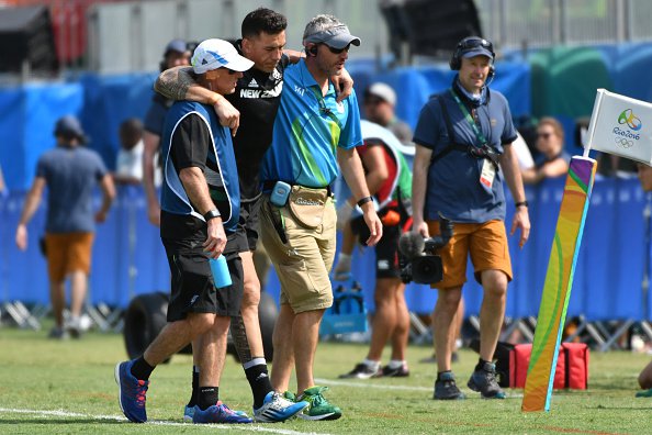 New Zealand's Sonny Bill Williams is helped from the field in the mens rugby sevens match between New Zealand and Japan during the Rio 2016 Olympic Games at Deodoro Stadium in Rio de Janeiro