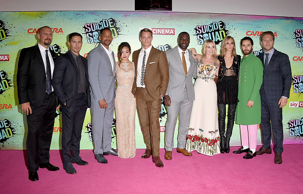 LONDON ENGLAND- AUGUST 03  David Ayer Jay Hernandez Will Smith Karen Fukuhara Joel Kinnaman Adewale Akinnuoye-Agbaje Margot Robbie Cara Delevingne Jared Leto and Jai Courtney attend the Suicide Squad European Premiere sponsored by Carre