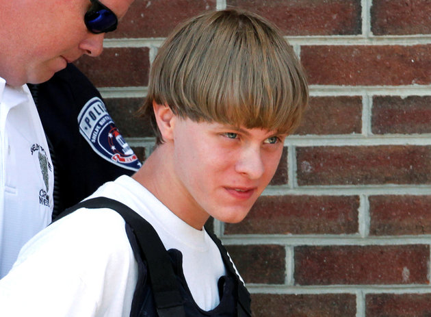 Jason Miczek  Reuters
Police lead accused shooter Dylann Roof into the courthouse in Shelby North Carolina