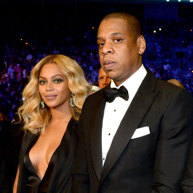 Beyonce and Jay Z rock matching grey power suits at Hands of Stone premiere in New York