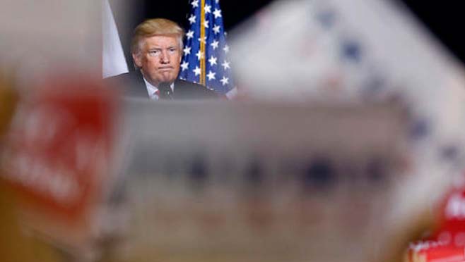 Republican presidential candidate Donald Trump pauses while speaking at a campaign rally in Tampa Fla. Wednesday Aug. 24 2016