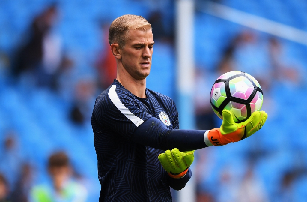 MANCHESTER ENGLAND- AUGUST 13 Joe Hart of Manchester City warms up prior to kick off during the Premier League match between Manchester City and Sunderland at Etihad Stadium