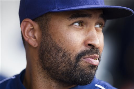 San Diego Padres right fielder Matt Kemp looks out at the field from the dugout during the team's baseball game against the Cincinnati Reds on Saturday July 30 2016 in San Diego. The Atlanta Braves acquired Kemp and.5 million from San Diego for outfiel