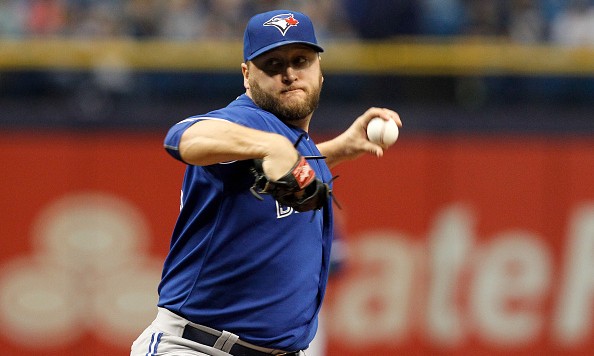 ST PETERSBURG FL- OCTOBER 4 Mark Buehrle #56 of the Toronto Blue Jays pitches during the first inning of game between the Tampa Bay Rays and the Toronto Blue Jays at Tropicana Field