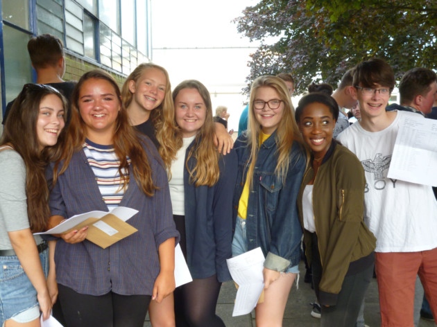 John Henry Newman School students with their GCSE results