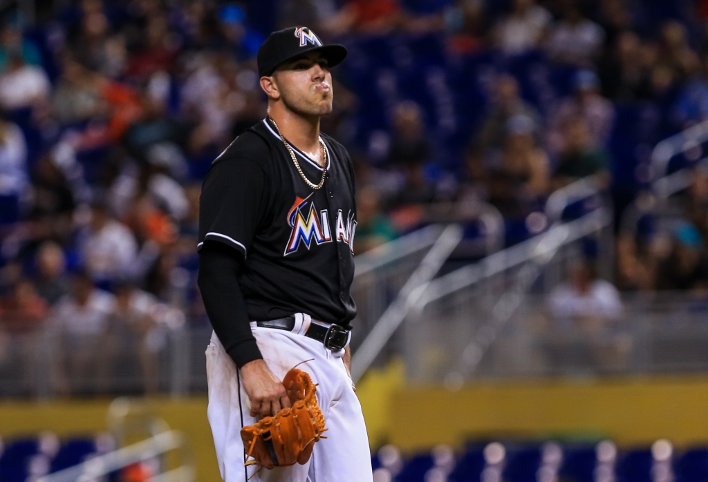 Jose Fernandez #16 of the Miami Marlins reacts after giving up his second home run of the third inning of the game against the St. Louis Cardinals at Marlins Park