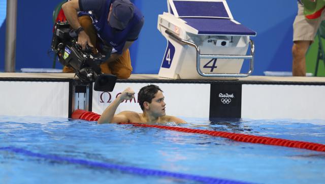 Joseph Schooling reacts after winning the gold medal in the men’s 100-metre butterfly finals at Olympics Aquatics Stadium