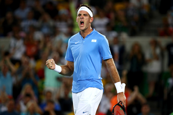 Juan Martin Del Potro celebrates winning a point against Novak Djokovic at the Olympics in Rio