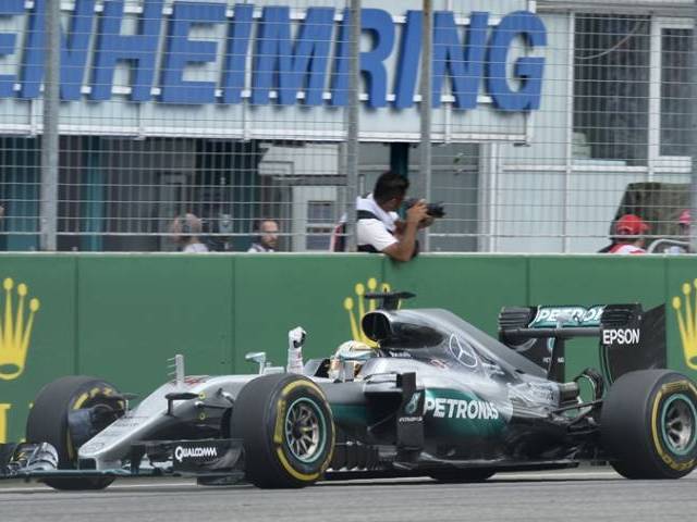 Mercedes AMG Petronas F1 Team's British driver Lewis Hamilton wins the Hockenheim circuit southern Germany