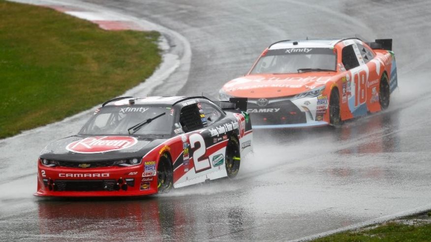 Sam Hornish leads Owen Kelly through a corner on the track during the NASCAR Xfinity Series auto race at Mid Ohio Sports Car Course Saturday Aug. 13 2015 in Lexington Ohio