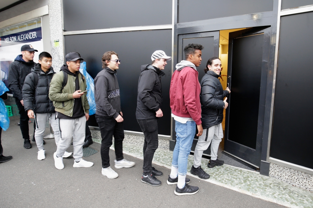 The first shoppers enter the Kayne West Melbourne Pop Up store