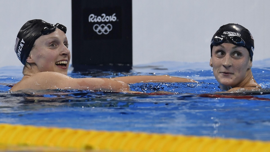 Katie Ledecky set a new world record Friday in the women's 800-meter freestyle. In the pool she celebrated with Team USA teammate Leah Smith