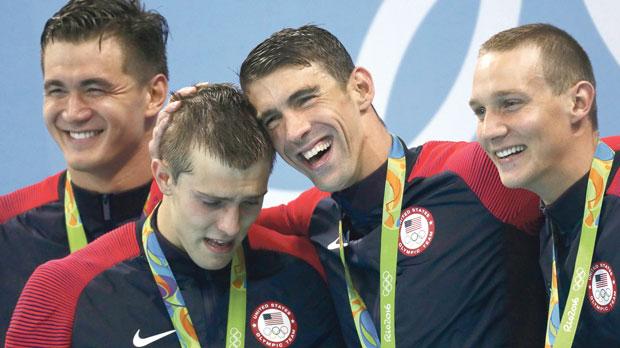 Michael Phelps with his 4x100m freestyle team-mates from the United States