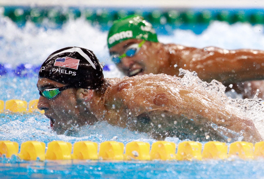 Michael Phelps of the United States leads Chad le Clos of South Africa in the Men's 200m Butterfly Final on Day 4 of the Rio 2016 Olympic Games at the Olympic Aquatics Stadium