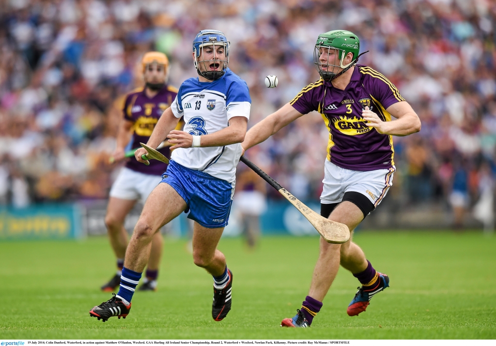 Keep it up Waterford’s Colin Dunford battles over a bouncing ball with Wexford’s Matthew O’HanlonRay McManus