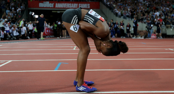 Kendra Harrison reacts after setting a new world record in the women’s 100m hurdles at the Olympic Stadium London