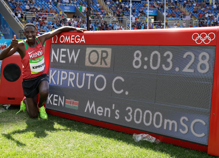 Kenya's Conseslus Kipruto gives a thumb up after setting a new Olympic record when winning the men's 3000-meter steeplechase final in Rio Wednesday. — AP