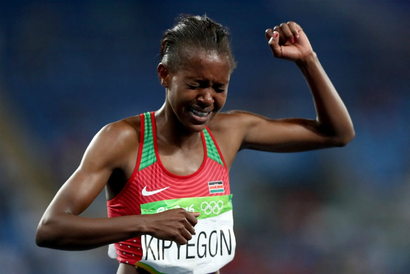 Kenya's Faith Chepngetich Kipyegon struggles to containl her emotions after winning the gold medal.  Internet