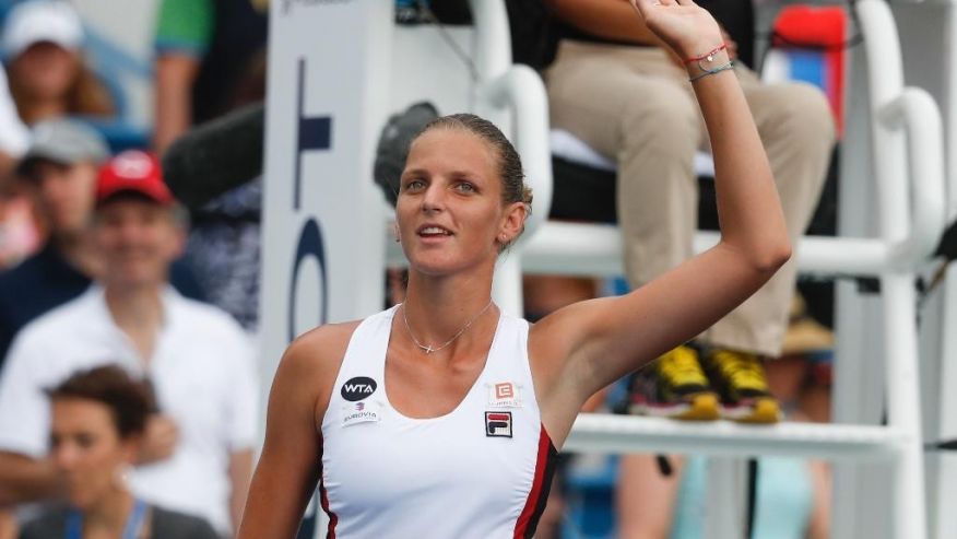 Karolina Pliskova of the Czech Republic waves to the crowd after winning he match against Garbine Muguruza of Spain during the semifinals of the Western & Southern Open tennis tournament Saturday Aug. 20 2016 in Mason Ohio. Pliskova won 6-1 6-3