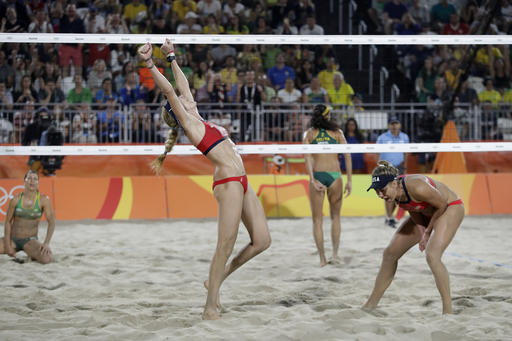 United States Kerri Walsh Jennings center celebrates with teammate April Ross right after defeating Brazil during the women's beach volleyball bronze medal match of the 2016 Summer Olympics in Rio de Janeiro Brazil Wednesday Aug. 17 2016. AP Phot