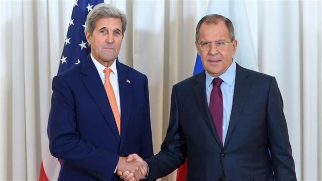 US Secretary of State John Kerry shakes hands with Russian Foreign Minister Sergei Lavrov