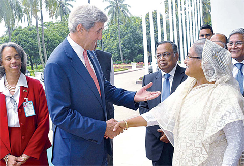 DHAKA US Secretary of State John Kerry and Bangladesh Prime Minister Sheikh Hasina shake hands ahead of a meeting in Dhaka yesterday. US Secretary of State John Kerry held talks with Bangladesh’s Prime Minister Sheikh Hasina on combating extremi