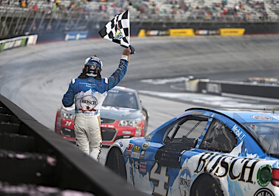 Kevin Harvick took the checkered flag at the rain-delayed Sprint Cup Series race at Bristol Motor Speedway on Sunday