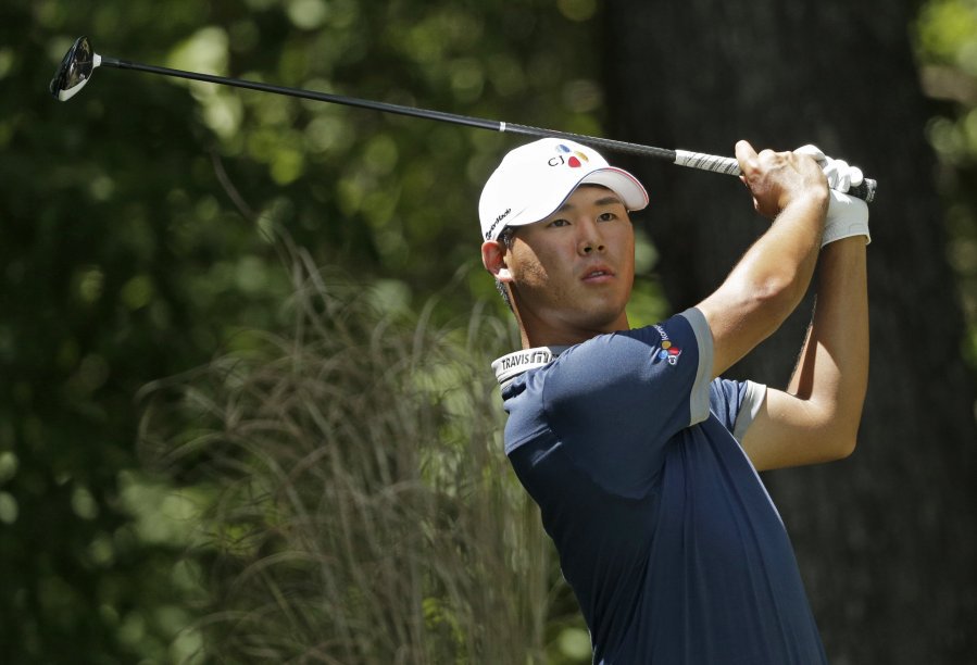 Associated Press Si Woo Kim watches his tee shot on the second hole during the third round of the Wyndham Championship golf tournament in Greensboro N.C. Saturday Aug. 20 2016