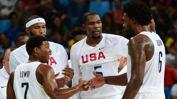 Huddle Kyle Lowry with teammates De Andre Jordan De Marcus Cousins and Kevin Durant during the Group A game between the