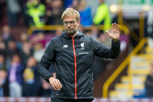 Liverpool's German manager Jurgen Klopp gestures to supporters as he makes his way from the pitch after the English Premier League football match between Burnley and Liverpool at Turf Moor in Burnley north west England