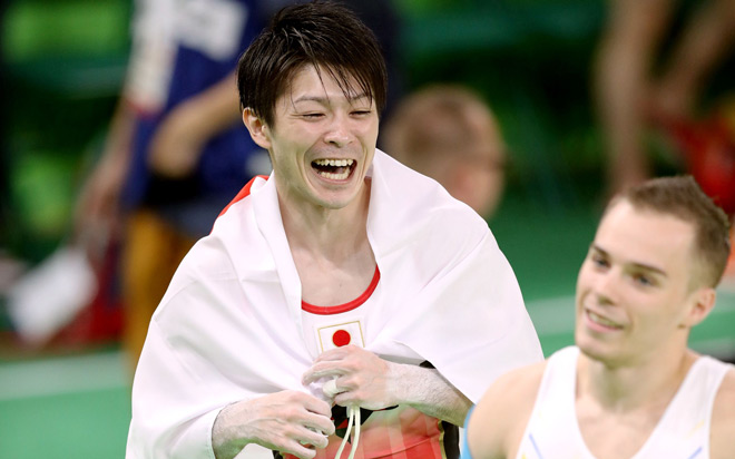 Kohei Uchimura left is overjoyed in Rio de Janeiro on Aug. 10 after he won the gymnastics men’s individual all-around title