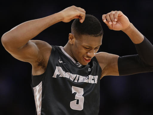 Providence guard Kris Dunn reacts after a turnover in the second half of an NCAA college basketball game against Villanova during the semifinals of the Big East men's tournament Friday