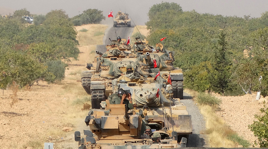 Turkish army tanks make their way towards the Syrian border town of Jarablus Syria