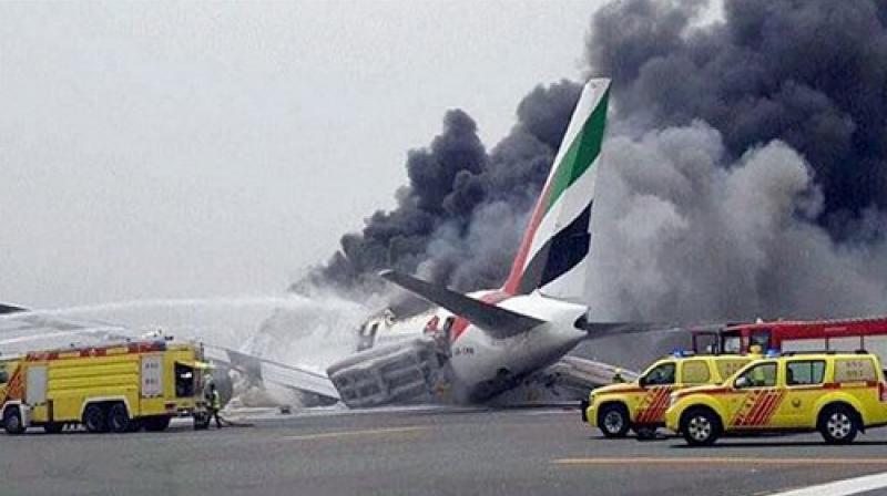 Emirates Boeing 777-300 aircraft carrying 300 people including 226 Indians crash-landed and exploded on the runway of Dubai International Airport