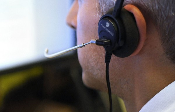 A call centre worker using a headset