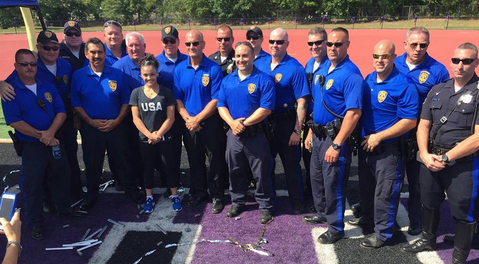 Laurie Hernandez with members of the Old Bridge Police