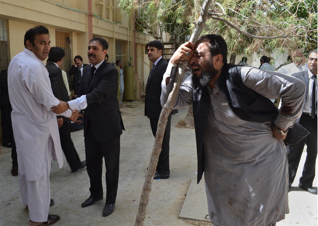 Pakistani lawyers mourn the deaths of their colleagues following a bomb blast. A powerful bomb went off inside a government-run hospital in the southwestern city of Quetta on Monday killing dozens of people and wounding dozens of others police said. Ass