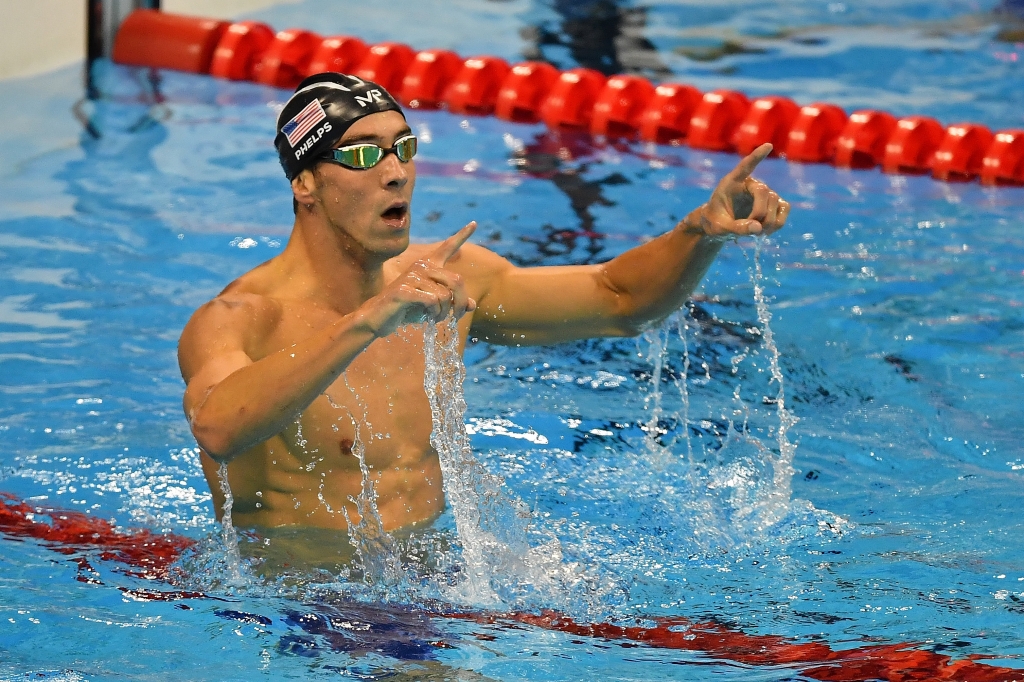 Michael Phelps celebrates winning gold in the Men's 200m Butterfly Final on Day 4 of the Rio 2016 Olympic Games