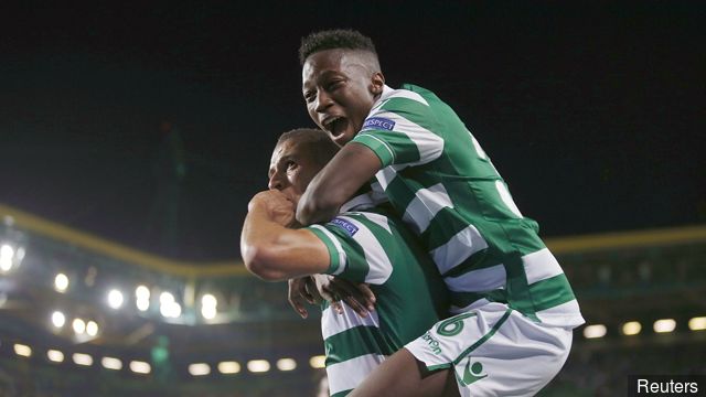 Sporting's Islam Slimani celebrates his goal with team mate Carlos Mane during their Champions League play-off match against CSKA Moscow