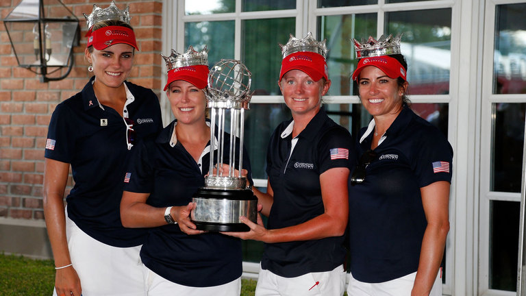 Lexi Thompson Cristie Kerr Stacy Lewis and Gerina Piller of the United States pose with the trophy after winning the International Crown