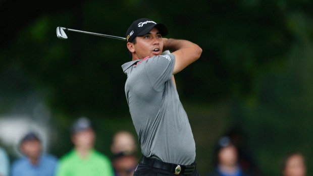 Jason Day tees off on the fourth hole during the Sunday round of the 2016 PGA Championship. Day has surged into the lead