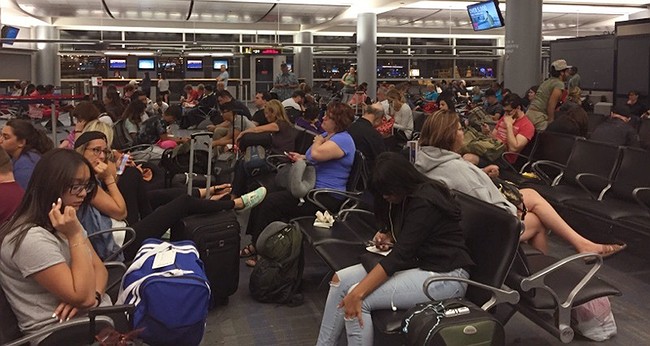 Delta flights grounded after 'system outage', causing mass delays