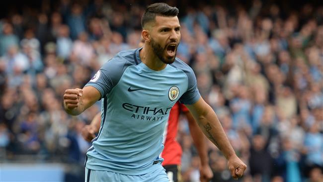 Manchester City's Argentinian striker Sergio Aguero celebrates scoring the opening goal from the penalty spot during the English Premier League football match between Manchester City and Sunderland at the Etihad Stadium in Manchester north west Engla